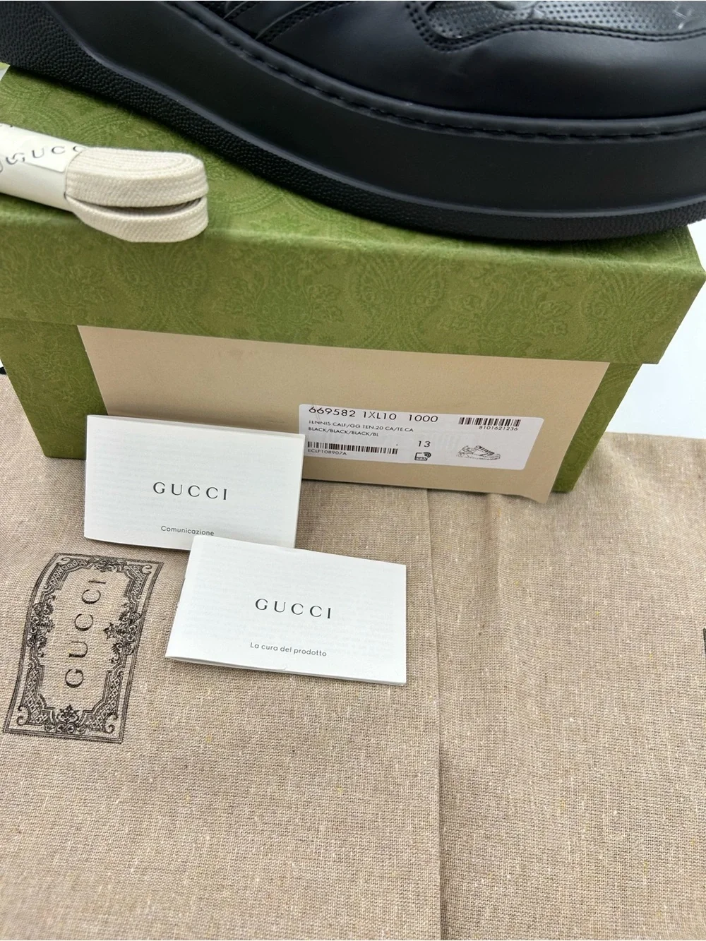 Men's Gucci, Gigi embossed leather sneakers size 13 fits 13.5 US made in Italy
